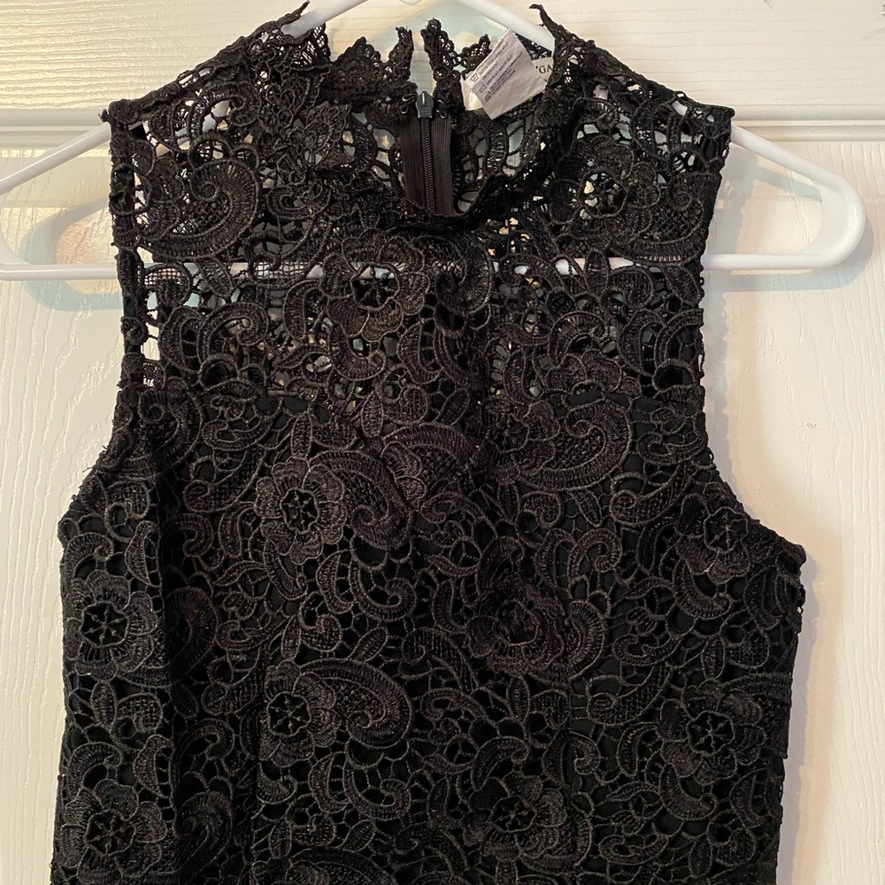 Black embroidered crop top.